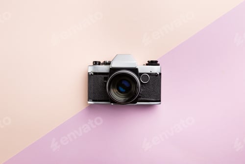 Preview: Vintage camera on color background