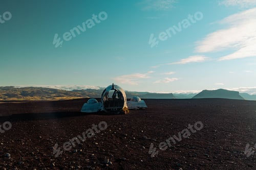 Preview: Abandoned airplane in field