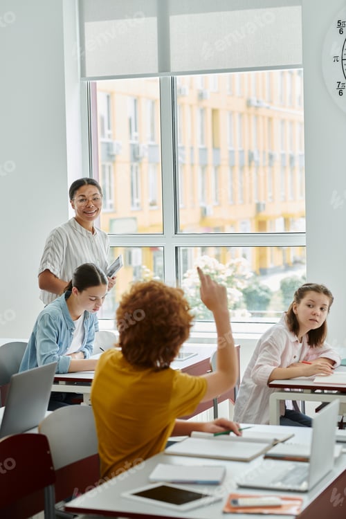 Preview: Teacher and Students in Class at School