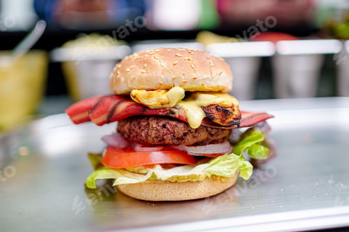Preview: cook prepares vegan burger in her restaurant