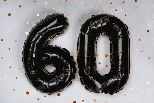 Preview: Celebrating a milestone birthday with black balloons and gold confetti backdrop
