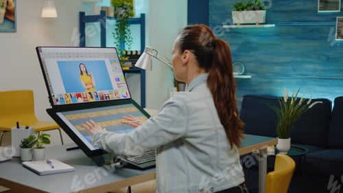 Preview: Photographer editing pictures at professional studio