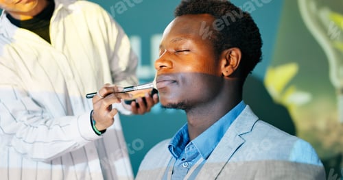 Preview: Makeup, man and tv presenter in studio preparing for public speaking or press interview on talk sho