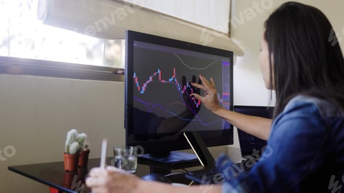 Preview: Trading woman analysing chart on crypto app. Stock exchange strategy