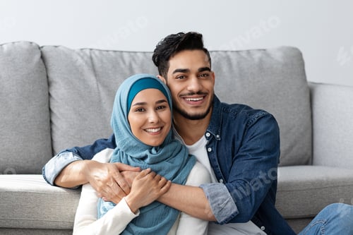 Preview: Closeup of muslim family hugging and smiling