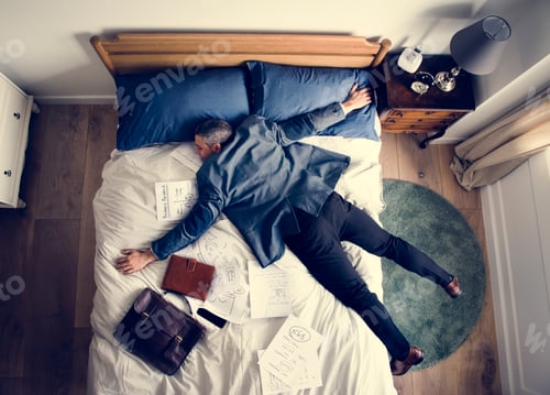 Preview: Exhausted business man falling asleep as soon as he came back home