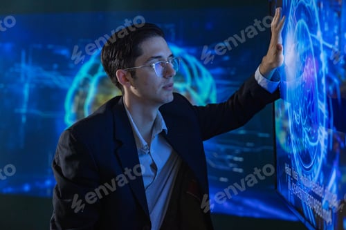 Preview: Man Operating Futuristic Data Interface on Touchscreen