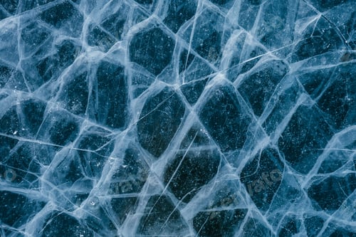 Preview: Amazing patterns of cracks on the frozen ice of Lake Baikal in winter.
