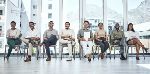 Preview: Shot of a group of people waiting to be interviewed for a job at a modern office