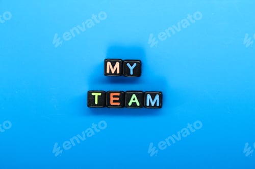 Preview: small black cubes with the word my team colored