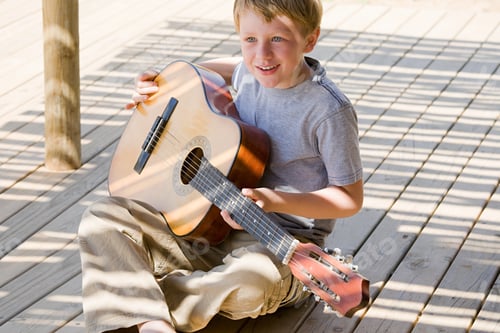 Preview: Boy playing guitar