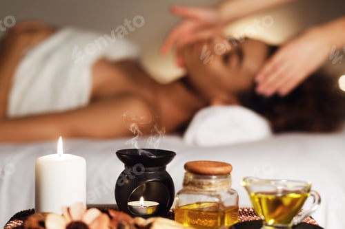 Preview: Aroma spa composition with candles and relaxing woman
