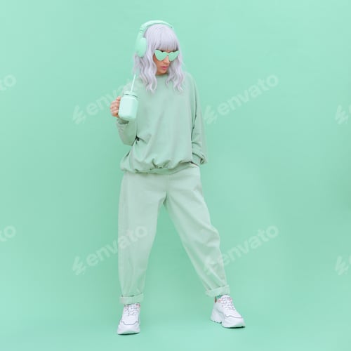 Preview: Aesthetic Dj girl drink fresh Smoothie. Minimal monochrome fashion design. Aqua menthe color trend