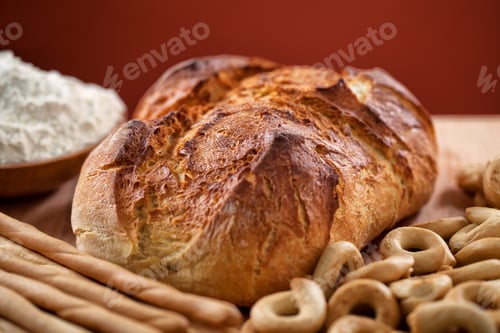 Preview: Assortment of bakery products on a wooden table.