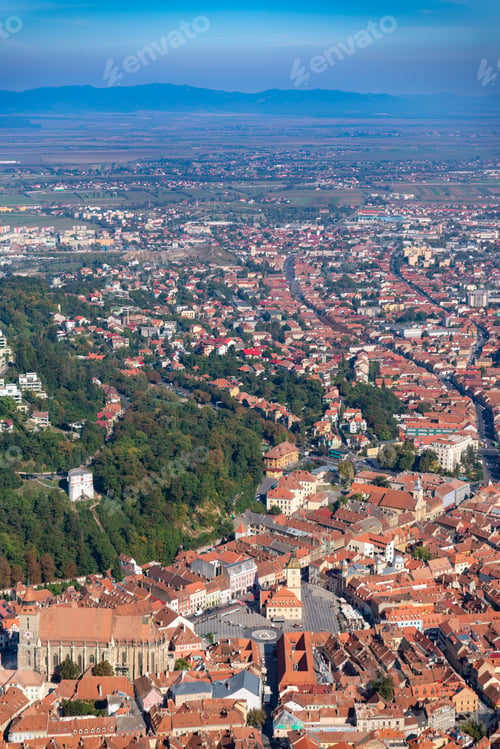 Preview: an aerial view of a city and its surrounding areas with buildings