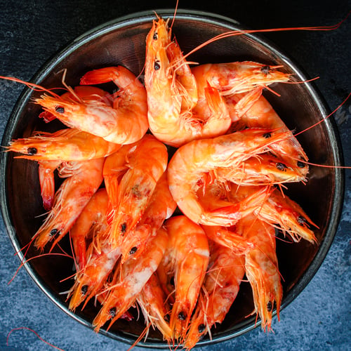 Preview: Shrimps Cooked Seafood Ready To Eat Prawn Serving Size Snack. Food Background Top View Copy Space