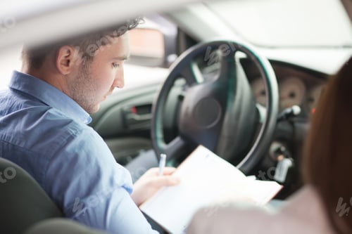 Preview: Businessman with notepad sitting in seat , looking out of window, thinking, side view