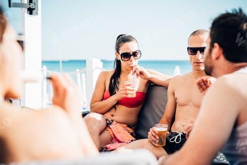 Preview: group of young multiethnic friends beach summer