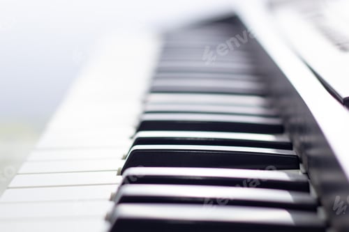 Preview: Close up of piano keyboard. Background with soft focus