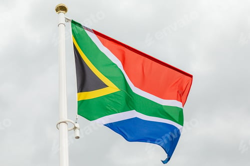 Preview: Republic of South Africa flag against white cloudy sky