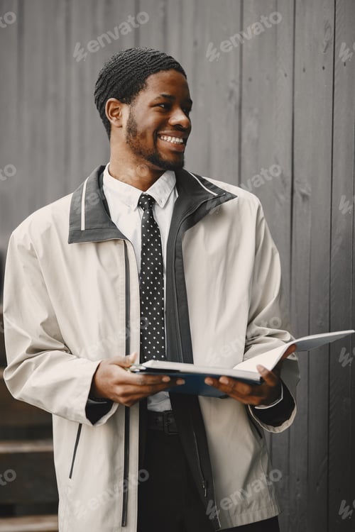 Preview: Man in the Street. Business Concept. Guy in an elegant black suit