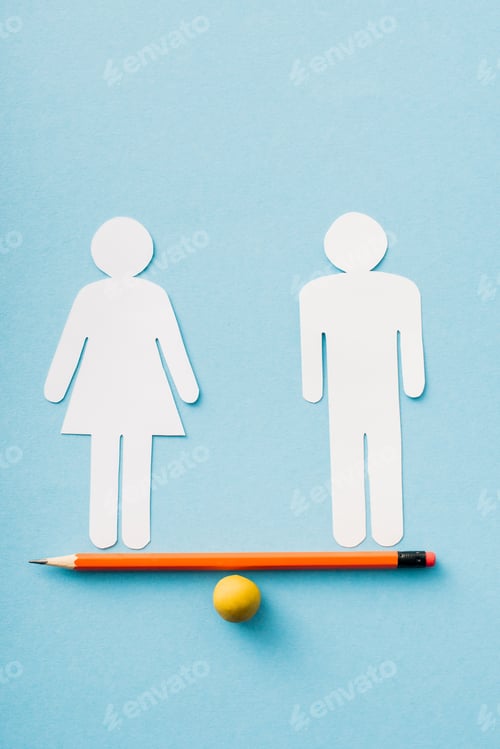 Preview: paper figures of couple as gender equality on pencil with ball isolated on blue, sexual equality