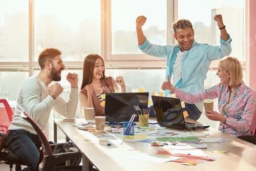 Preview: Group of winners celebrate victory or great success.