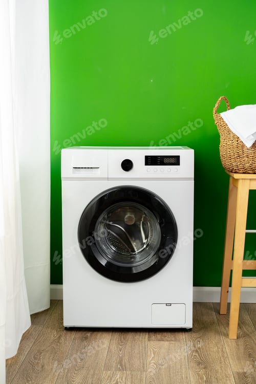Preview: Close up of washing machine in a laundry room