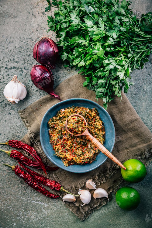 Preview: Homemade chimichurri paste with ingredients in a bowl