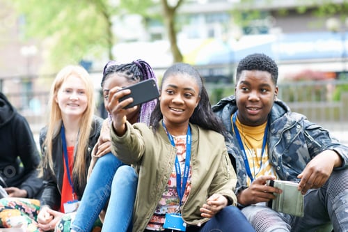Preview: Friends taking selfie with smartphone