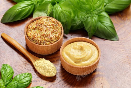 Preview: Dijon mustard in wooden bowls on the table