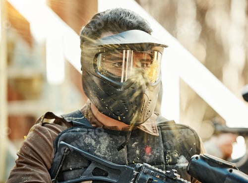 Preview: Paintball, shooting and action with man in playground for battlefield, mission and soldier. Sports,