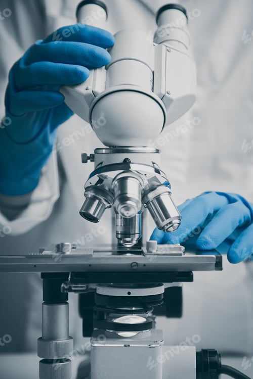 Preview: Close up of examining of test sample under the microscope