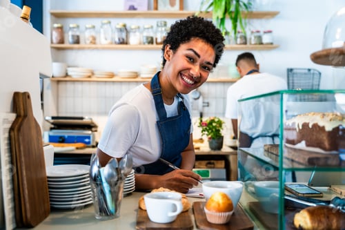 Preview: Barista and waiter working in a bar cafeteria shop