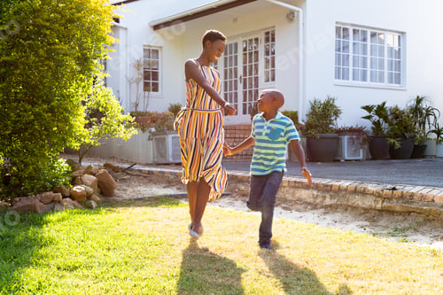 Preview: African American woman and her son, spending time together in the garden