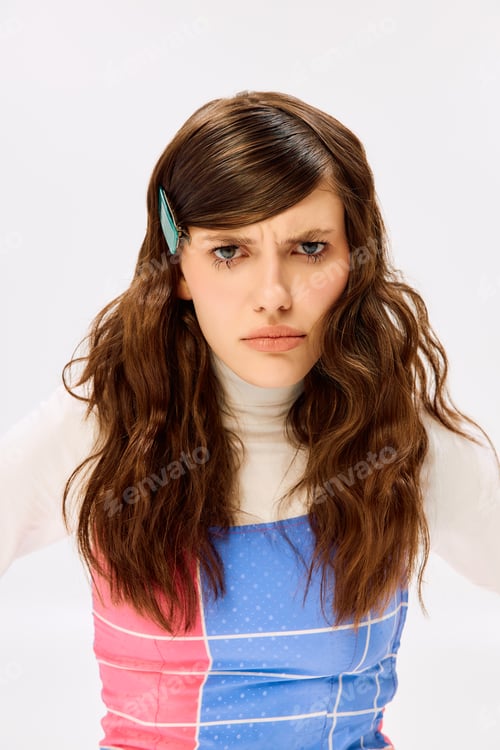 Preview: Young woman showcases vibrant fashion with expressive style and bold attitude
