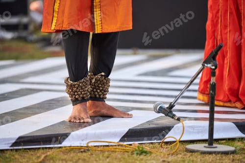 Preview: Small bells Ghungroo on male feet of indian dancer for ancient ethnic Kathak dance