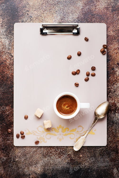 Preview: Clipboard with space for text, cup coffee, coffee beans and sugar. Top view. Flat lay style.