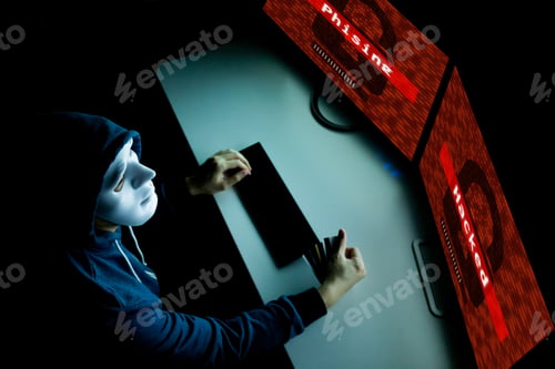 Preview: Hacker in mask under hood hacking and phishing victims from online shopping and finance activities.