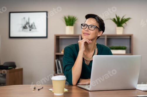 Preview: Young fashionable business woman thinking