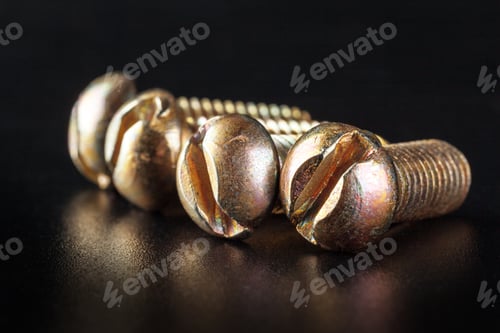 Preview: screws on black background