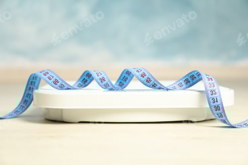 Preview: Scales and measuring tape. Weight loss concept