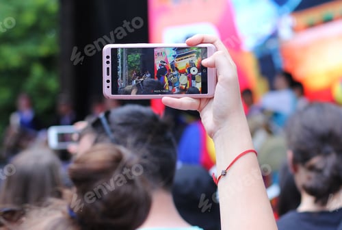 Preview: Using mobile phone at the music festival