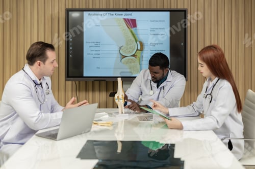 Preview: Surgeon and radiologist discuss Patient's knee joint 's MRI, plan for further procedure.