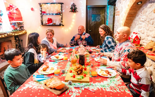 Family Celebrates Christmas with Food and Conversation