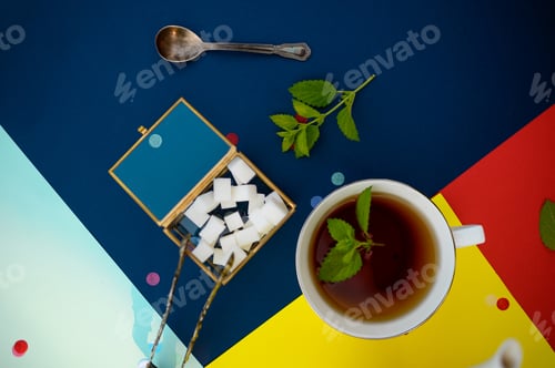 Preview: Table setting, tea with mint, teacup and sugar