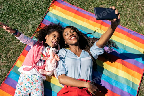 Preview: Afro Girl and her Mother Taking Selfie