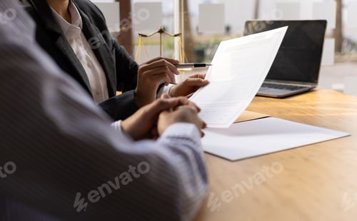 Preview: Female lawyer is explaining the terms of the legal contract document and client to sign it properly.