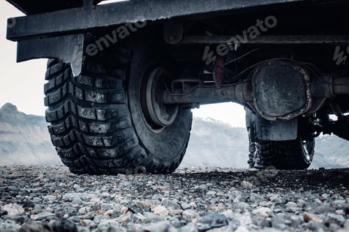 Preview: Massive truck wheels on rocks