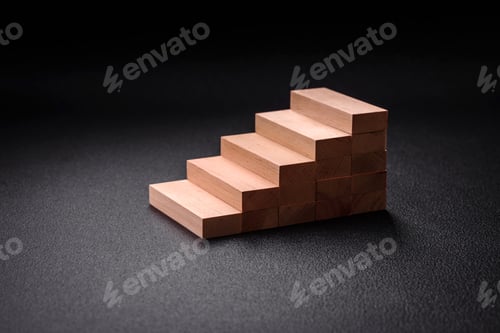 Preview: Wooden steps made of blocks as an idea of investment and profit growth in achieving a goal